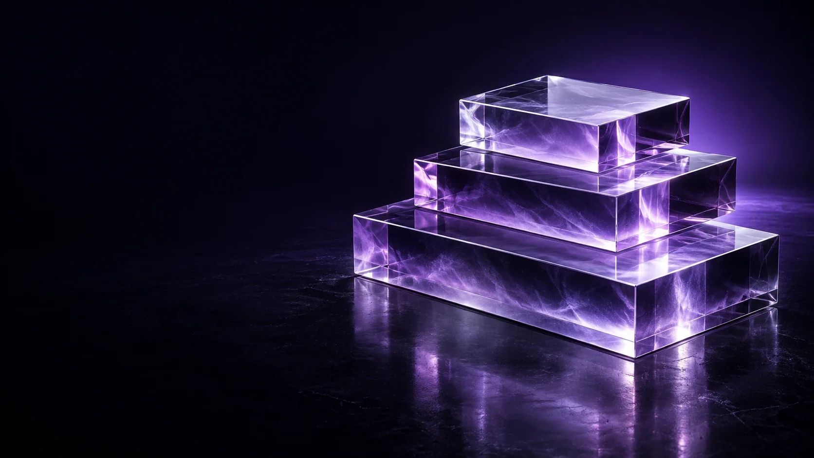 Three stacked translucent violet glass blocks