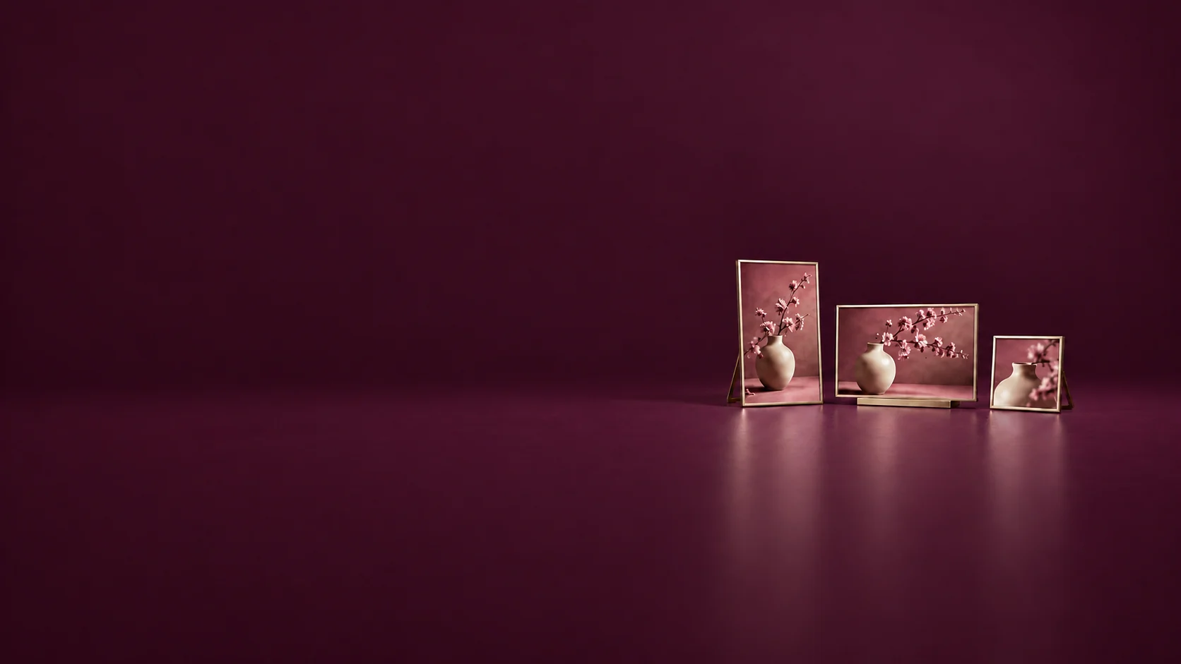 Three champagne display frames showing floral-vase photographs in portrait, landscape and square formats.
