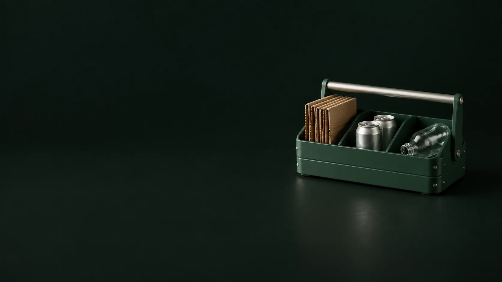 A green sorting caddy containing cardboard, plain aluminum cans and a clear glass bottle.