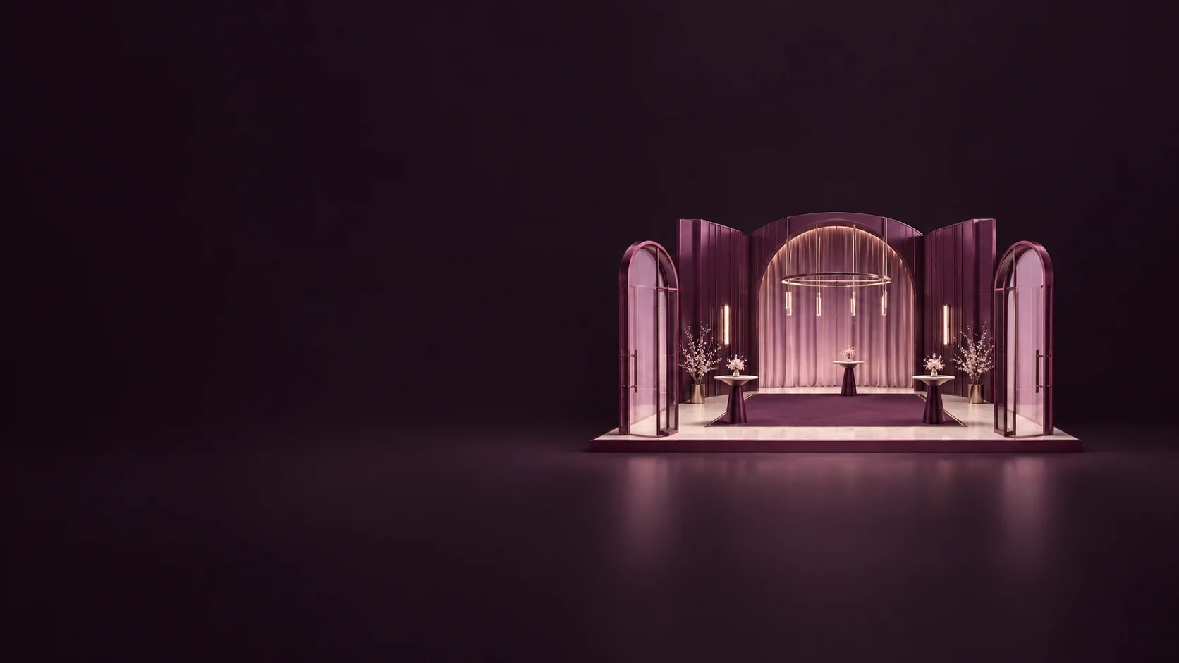 A miniature event hall with open doorways, three low tables and a broad empty floor on a shallow plinth.