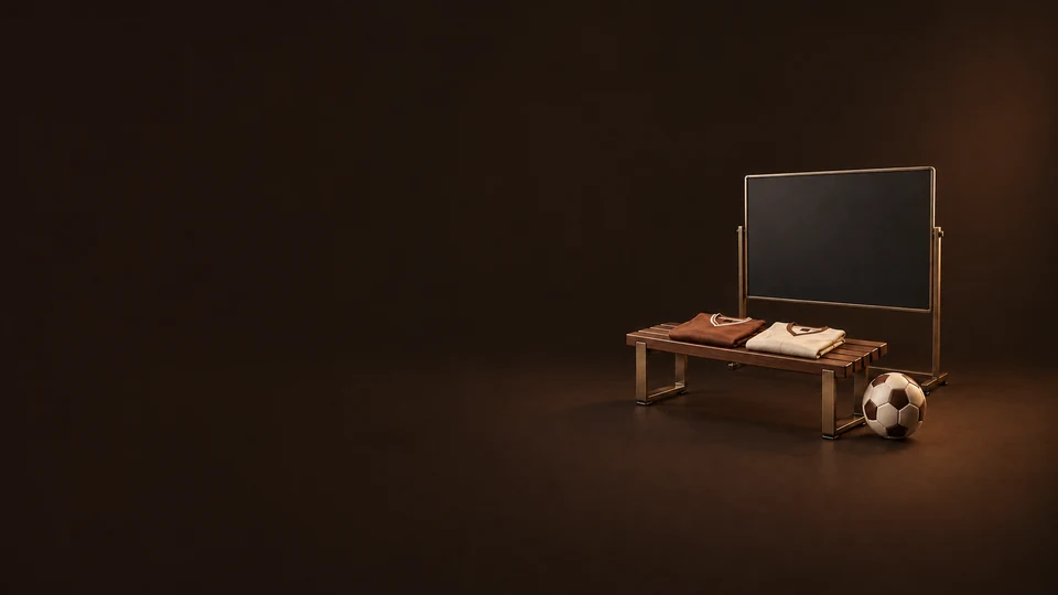 Two folded sports jerseys sit on a walnut bench beside a soccer ball and a blank charcoal fixture board.