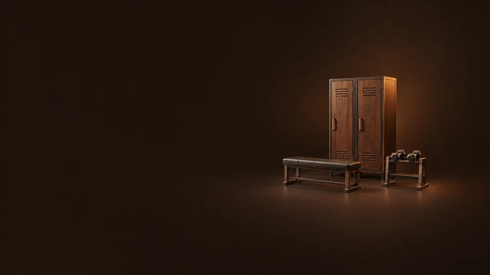Two walnut gym lockers stand behind an empty padded bench and a small metal dumbbell rack.