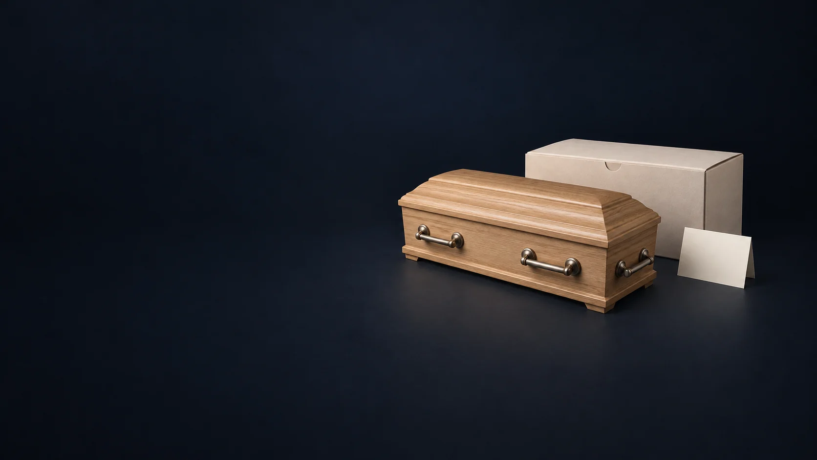 Closed oak casket model with complete metal handles beside an ivory delivery carton and blank destination card.