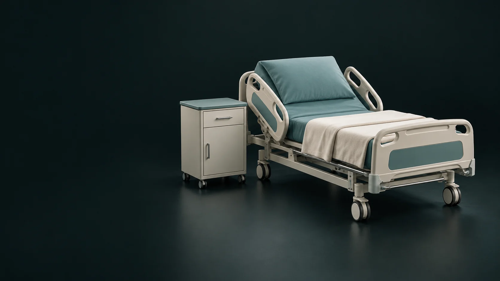 An empty adjustable hospital bed with teal mattress, folded blanket and a bedside cabinet.