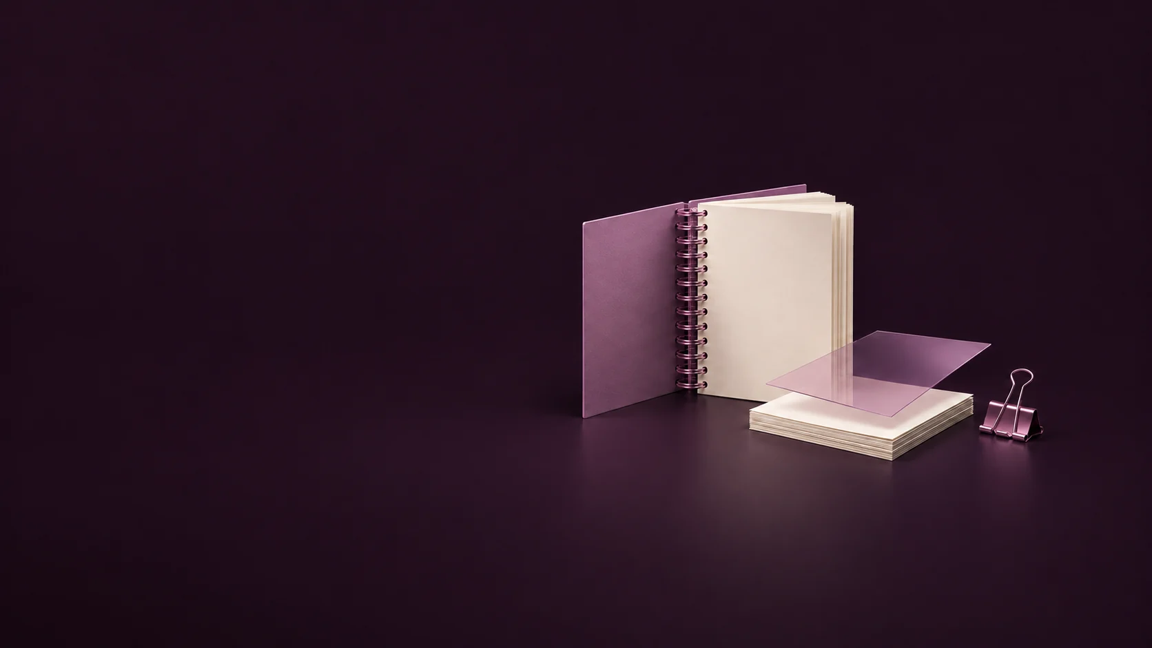 An open orchid spiral manual stands beside a loose paper stack, translucent lamination sheet and binder clip.