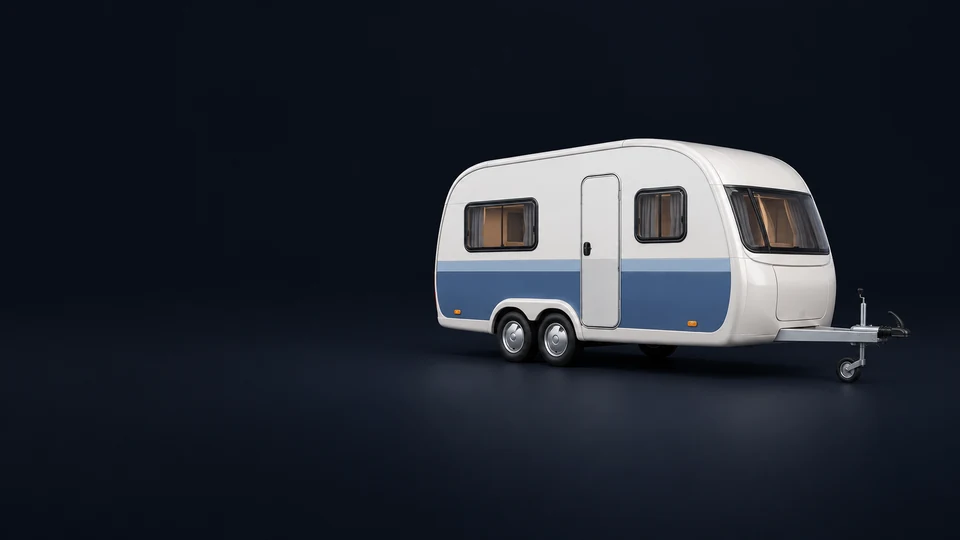 An ivory-and-blue travel trailer with a complete tow hitch and jockey wheel.